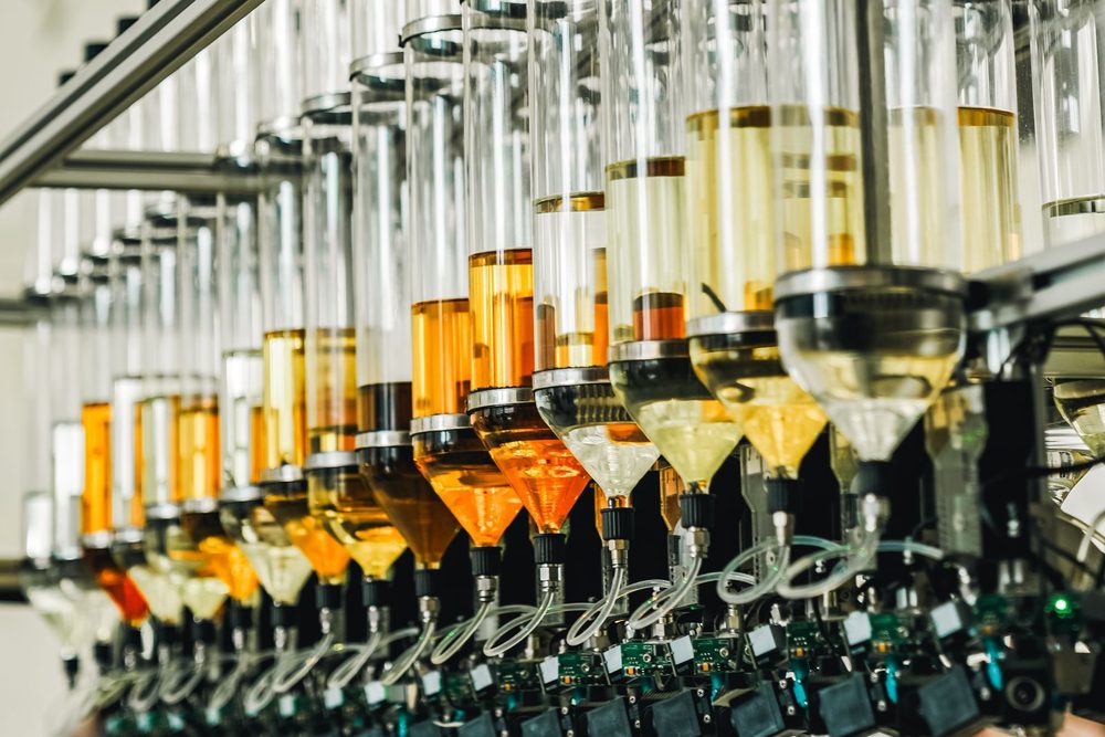 Automated liquid filling line in a manufacturing plant (stock photo)